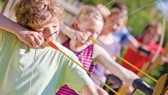 Children having a go at archery